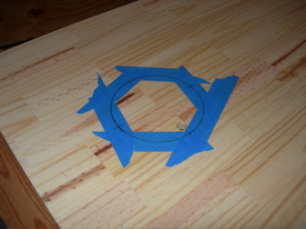 Mark a regulation 6" hole, tape the cut, and saw it clean—hole saw for speed, or jigsaw + router for a factory edge.