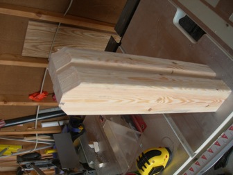 Rounded pivot ends cut into pine legs for folding cornhole board supports